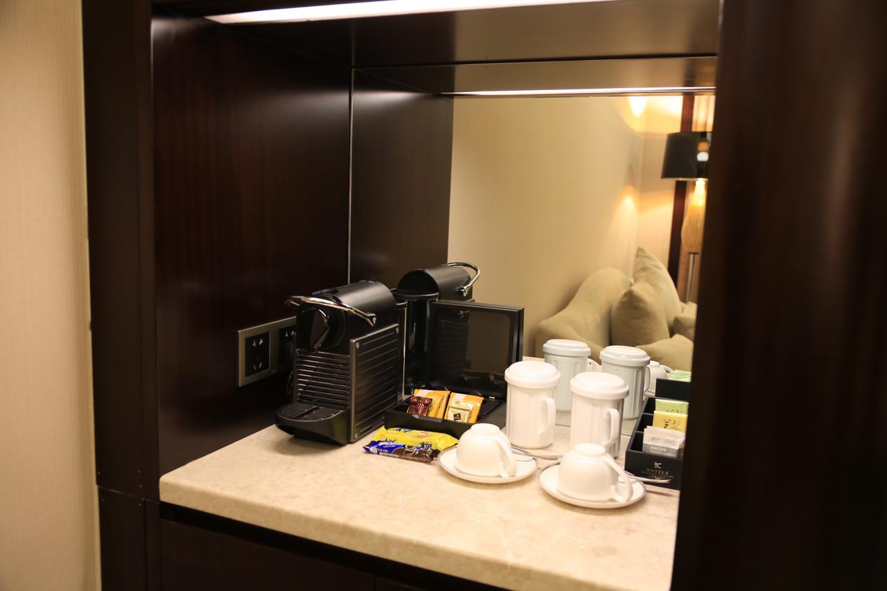 Hotel The Huiting Collection Wuhan Esterno foto